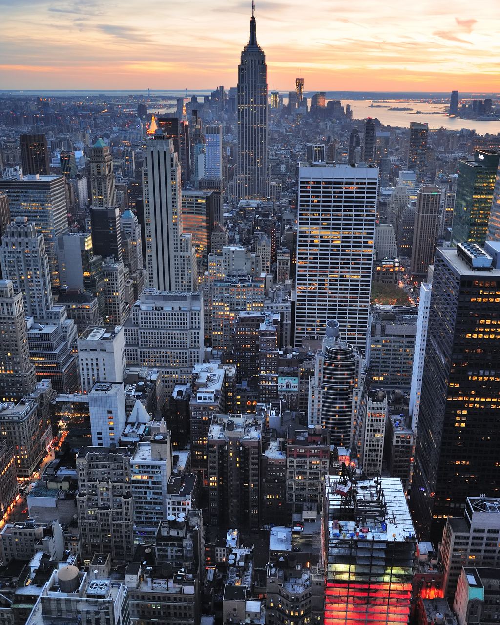The Empire State Building rising above Midtown Manhattan at dusk, New York